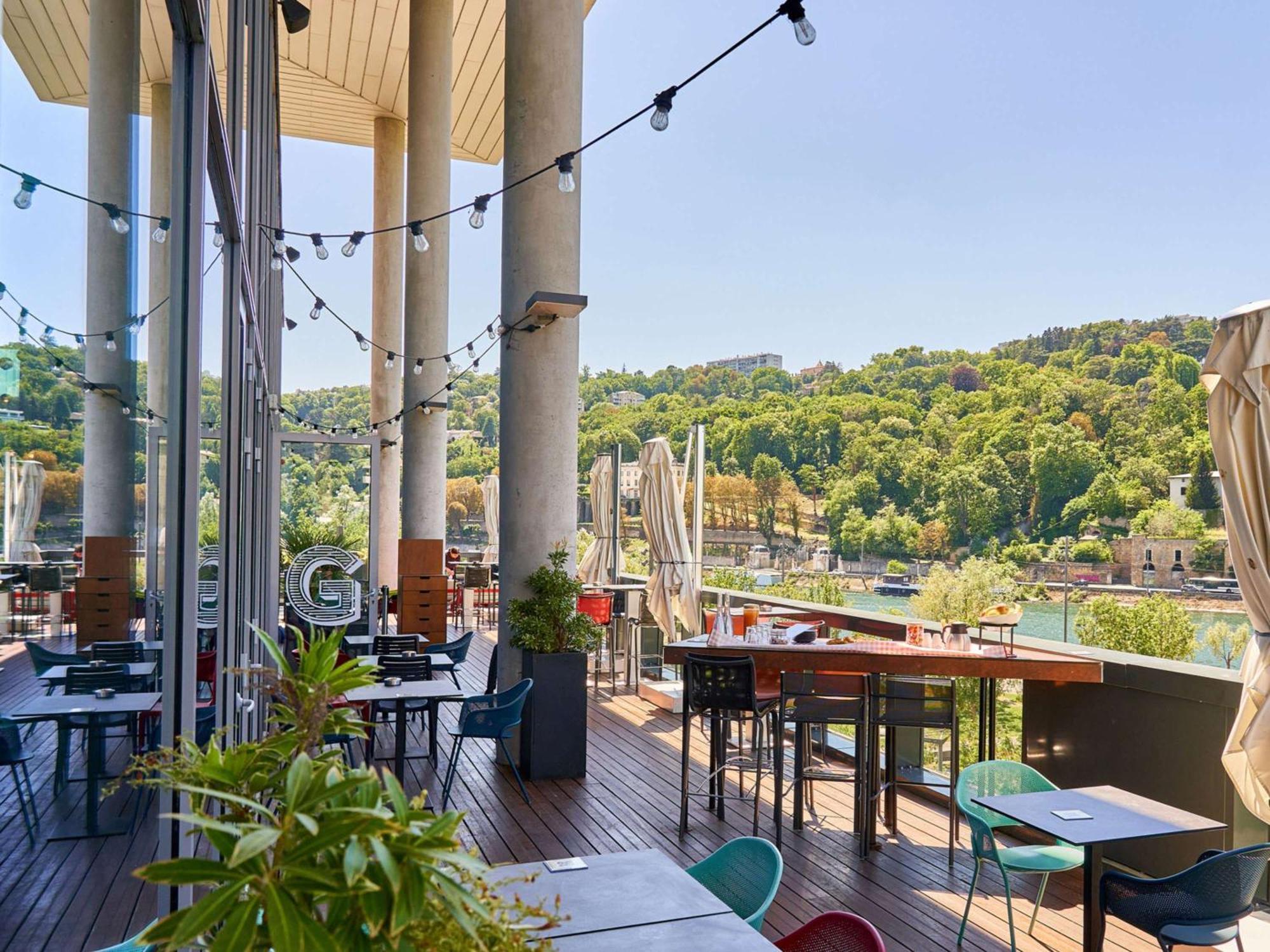 Novotel Lyon Centre-Confluence Bord De Saone Esterno foto